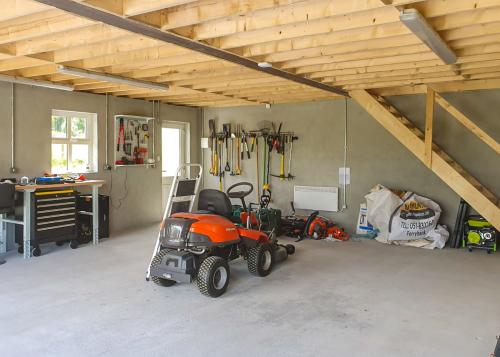 lawnmower and garden tools storage 