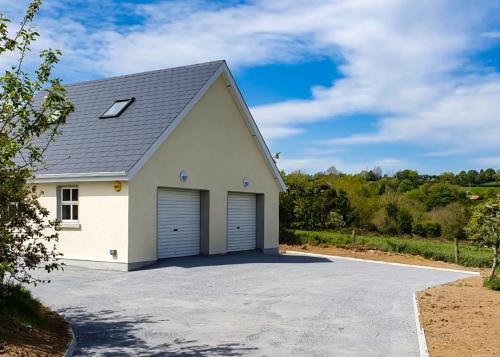 dual garage with double space above