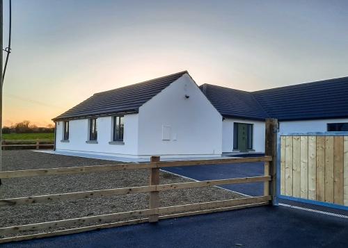 New house with sun in background