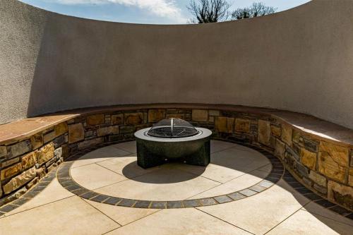 Sheltered Garden Fire pit with seating