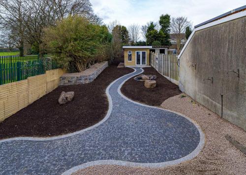 Large Curved Garden Path and Shed