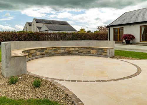 Garden plants and curved seat